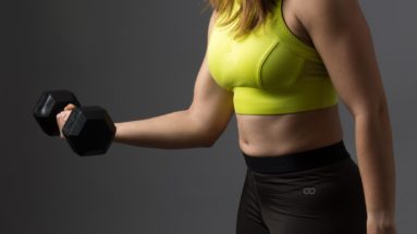 Woman lifting a dumbbell